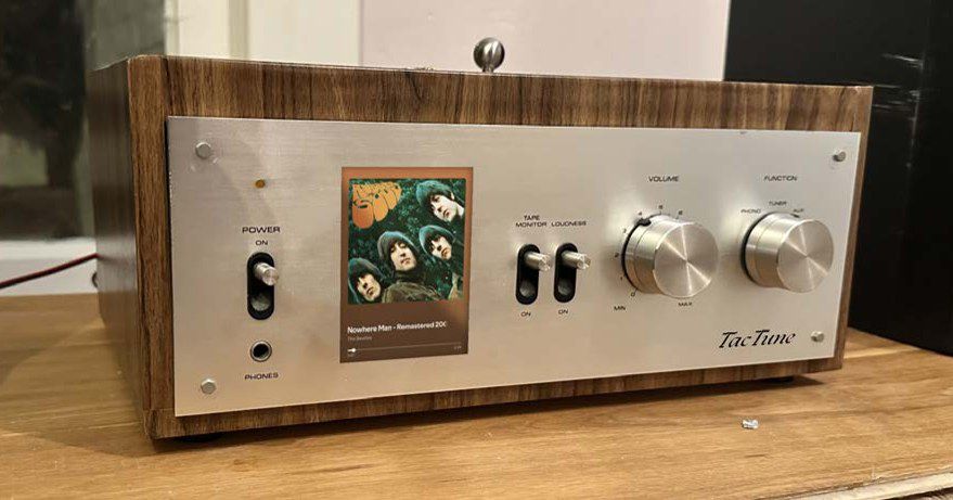 TacTune: a wooden hi-fi amplifier with a brushed aluminium front, knobs and the album art of Rubber Soul on a display