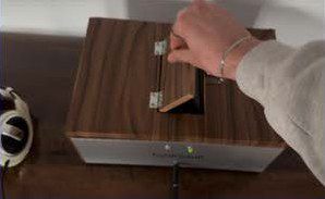 A hand closing the hatch