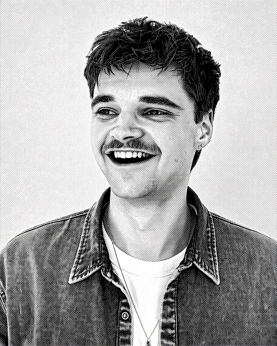 Portrait of Olaf Nijmeijer, smiling, in a denim shirt